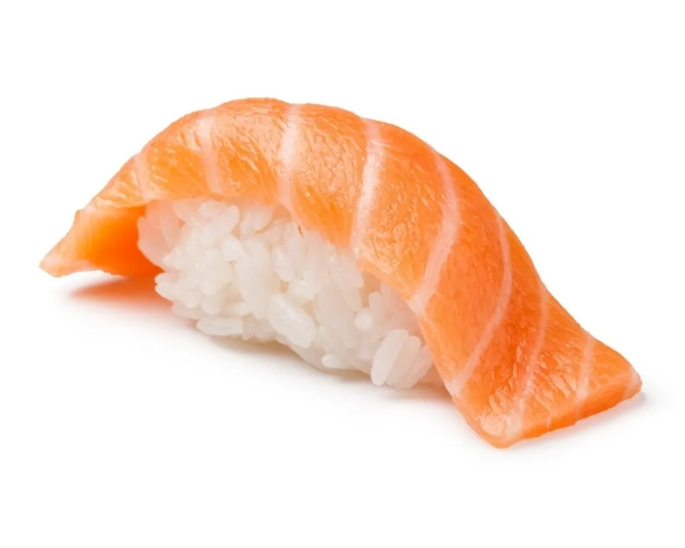 Salmon nigiri with vinegared rice and fresh salmon at Sushi & Maki, a Japanese Restaurant in Portland.